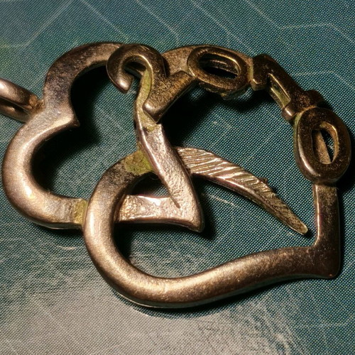 Silver necklace with two hearts and 2010 date used