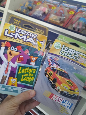 Leapster L-MAX learning game system with 2 sealed games Nascar and Letters on the Loose