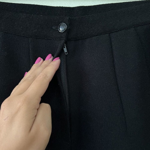A-Style black skirt with zipper and button, knee-length, new