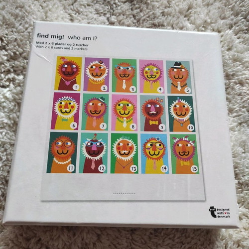 Guess Who game used with cards and marker