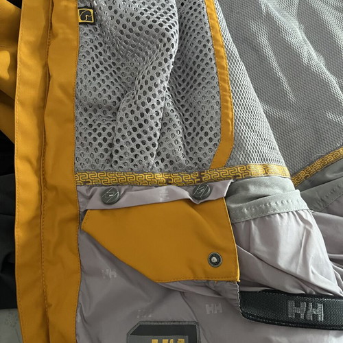 Helly Hansen jacket used, waterproof, warm, size L, yellow and orange