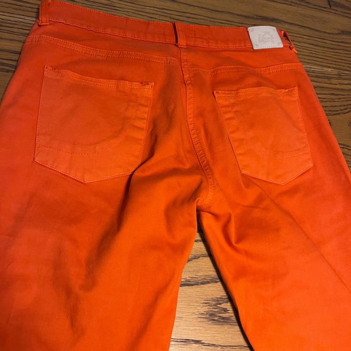 Orange pants like new made of Italian fabric