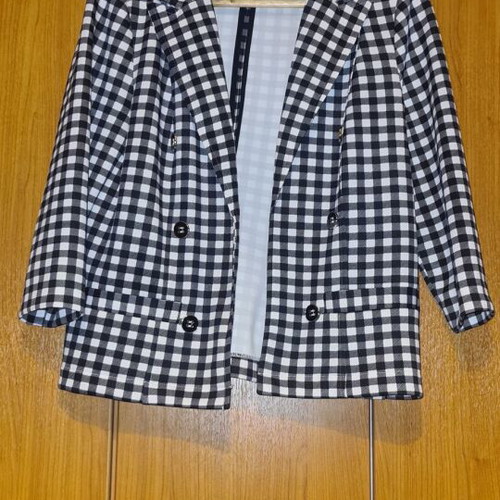 Checkers jacket with shoulder pads and elbow-length sleeves medium used