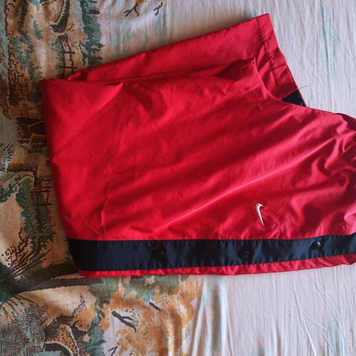 Nike sports pants with side buttons like new, black and red, size L