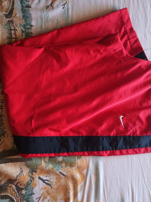 Nike sports pants with side buttons like new, black and red, size L