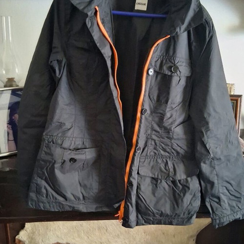 Windbreaker jacket like new with integrated hood unisex, black and orange, XL