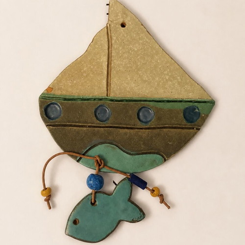 Ceramic hanging boat with fish wall decor