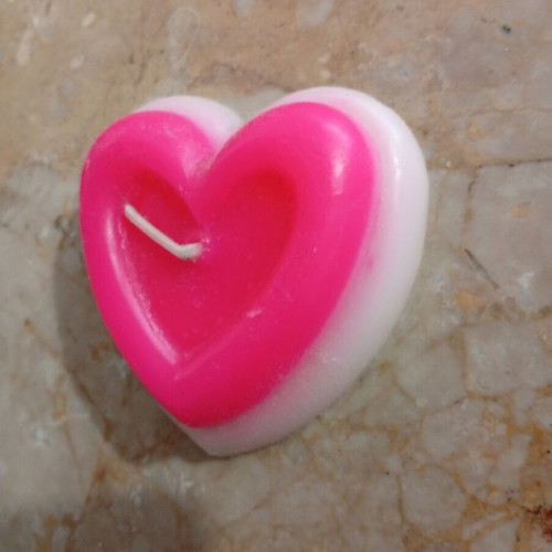 Handmade heart-shaped candle