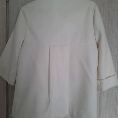 White On Line sugar coat like new with black buttons and 3/4 sleeves