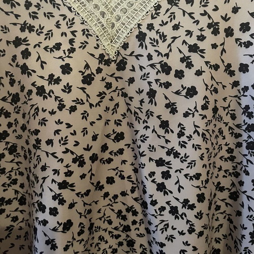 Women's blouse medium/large, beige with black floral pattern