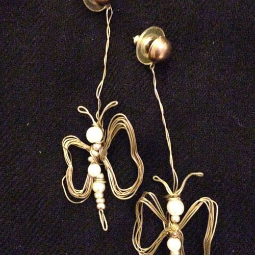 Brass earrings used, handmade butterfly design