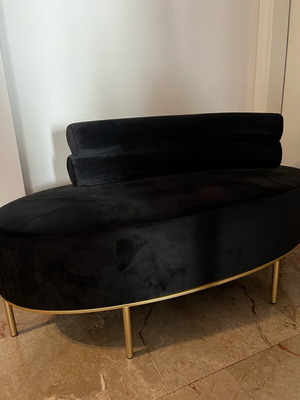 Inart sofa in like new condition with black velvet and gold metal legs
