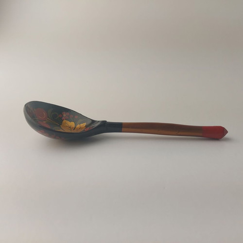 Old painted wooden spoon used