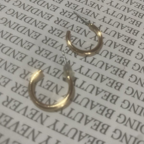 Gold earrings new, nice size and color