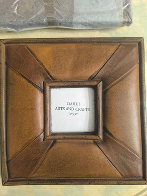 Brown photo frame with leather texture and geometric design like new