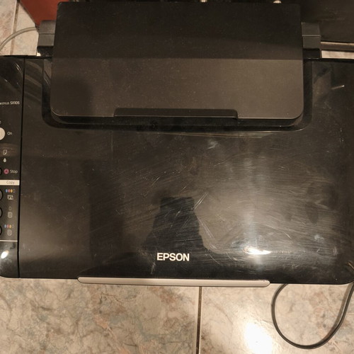 Epson Stylus SX105 multifunction printer used with new inks for parts