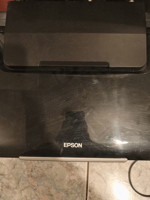 Epson Stylus SX105 multifunction printer used with new inks for parts