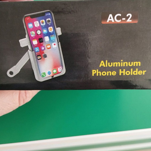 Metal phone holder for motorcycles like new, screws on mirror