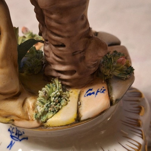 Capodimonte porcelain boy with flute like new with artist signature