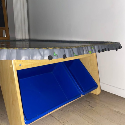 Children's play table with train track used