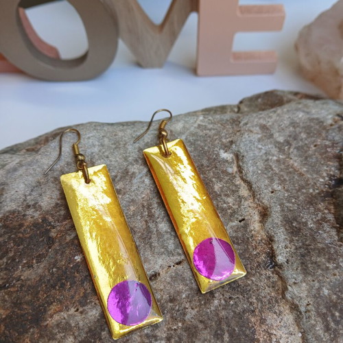 Handmade earrings with purple and gold resin