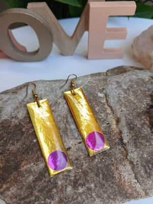 Handmade earrings with purple and gold resin