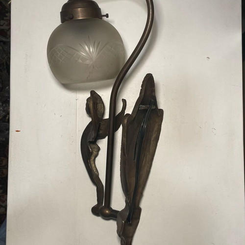 Bronze wall light like new with carved white glass and angel shape