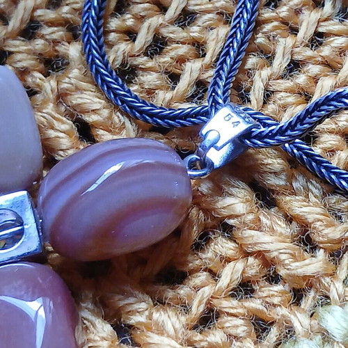 Silver necklace cross with carnelian stones used