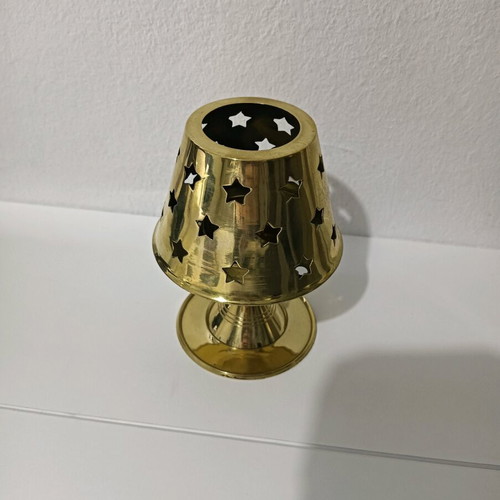 Candle holder for tealight used, gold color with stars
