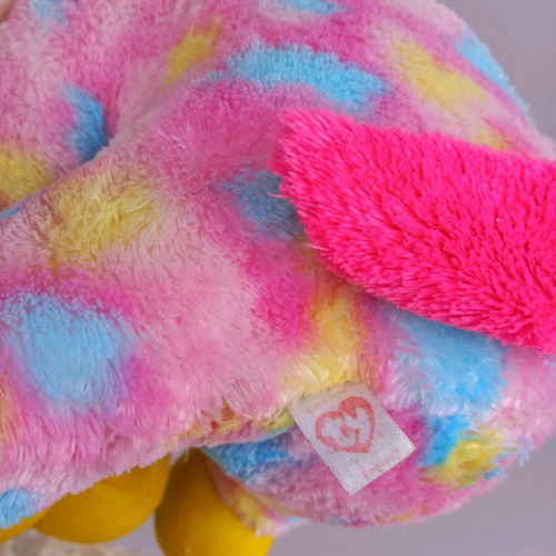 Plush unicorn used, very large, colorful with glass eyes