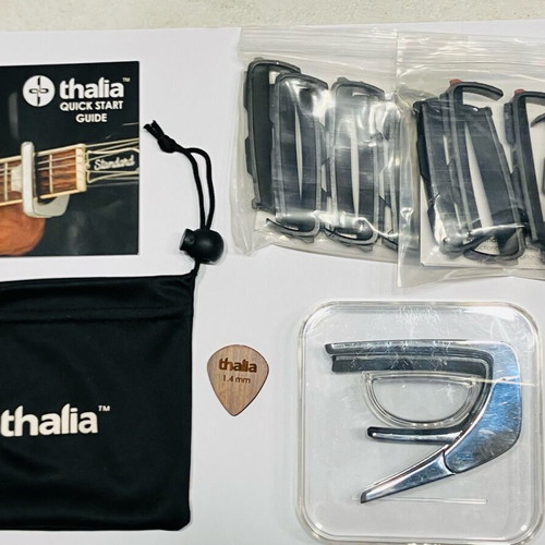 Thalia Exotic series capo new with Red Angel Wing decoration