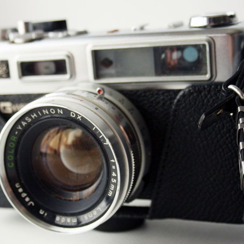 Yashica Electro 35 camera used with flash and case