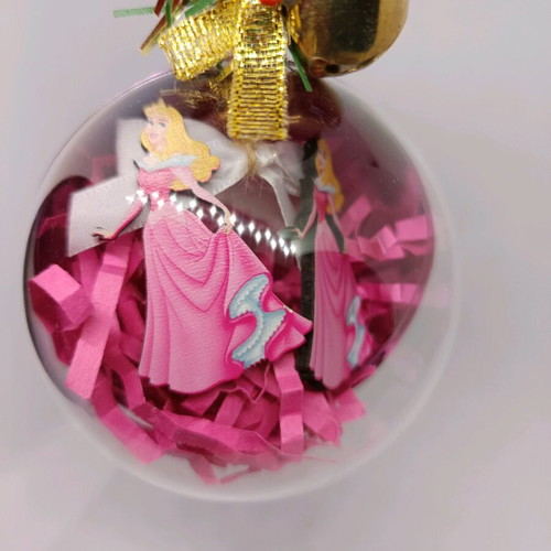 Earrings inside Christmas ball ornament like new