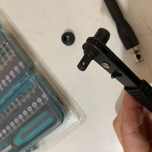 Screwdriver set in metal case with angle handle and ratchet