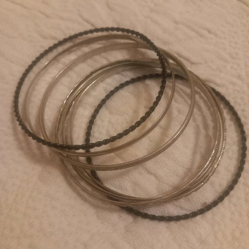 Bracelets used, set of 8, silver and black