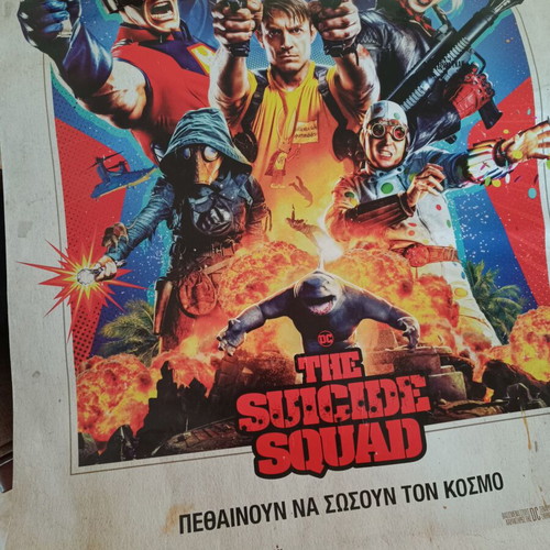 The Suicide Squad movie poster used with visible wear