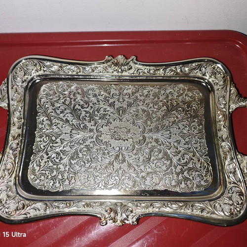 Decorative silver-plated serving tray like new with embossed designs
