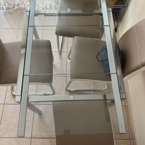 Glass dining table with 4 chairs used, extendable, beige leatherette