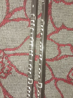 Set of 2 black pencils with musical notes