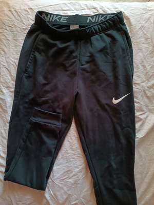 Nike women's slim-fit tracksuit pants like new, black, size S