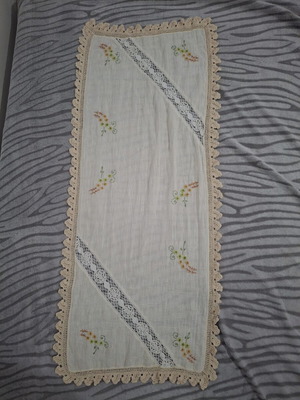 Beige table runner with embroidery used
