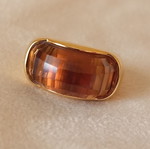 Women's ring used, Italian, gold color with honey transparent stone, size 53