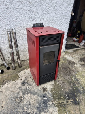 Pellet stove used with pipes and wheels