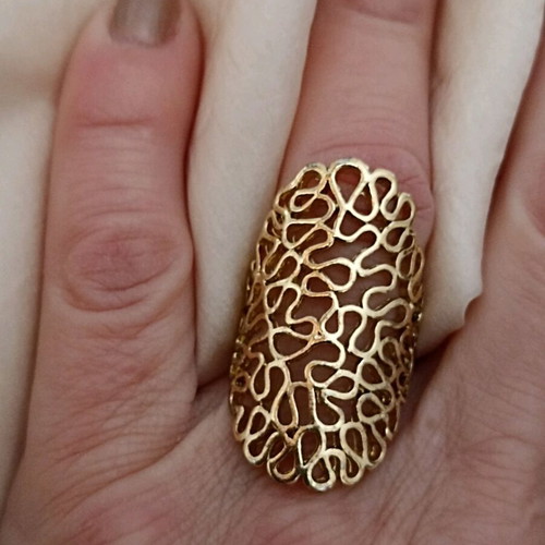 Gold ring ornate like new