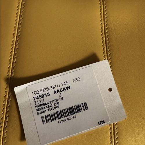 Gucci handbag new, yellow with long strap