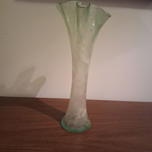Glass vase with wavy rim used, vintage light green