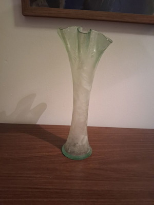 Glass vase with wavy rim used, vintage light green
