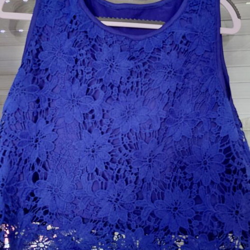 Women's sleeveless electric blue top with lace