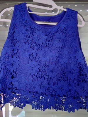 Women's sleeveless electric blue top with lace