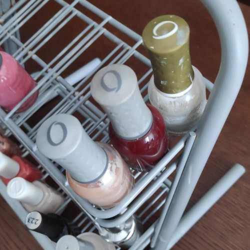 Orly metal tabletop stand with 36 slots for nail polishes used